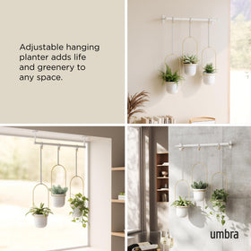 Umbra Triflora durable recycled polypropylene pots keep planters lightweight.