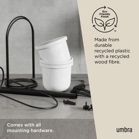 Umbra Triflora is outdoor-ready with drainage holes for patio herbs.