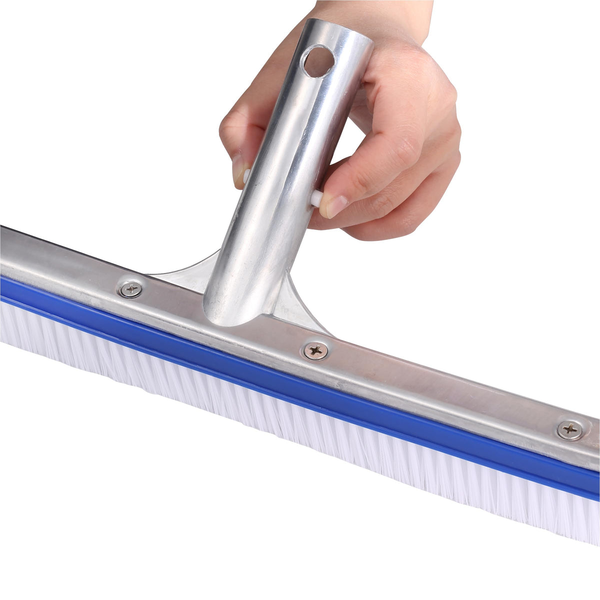 UNCO brush reaches corners and tile lines with ease