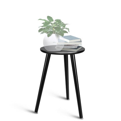 Uneedem indoor plant stand with round top showcases plants in a compact space.