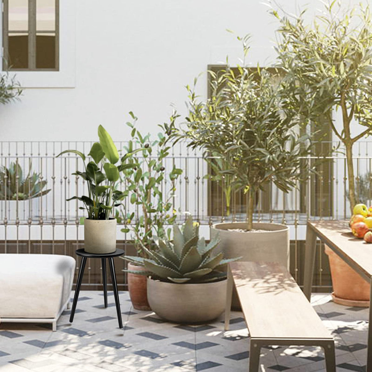 Uneedem plant stand can serve as a lightweight stool or bedside surface.