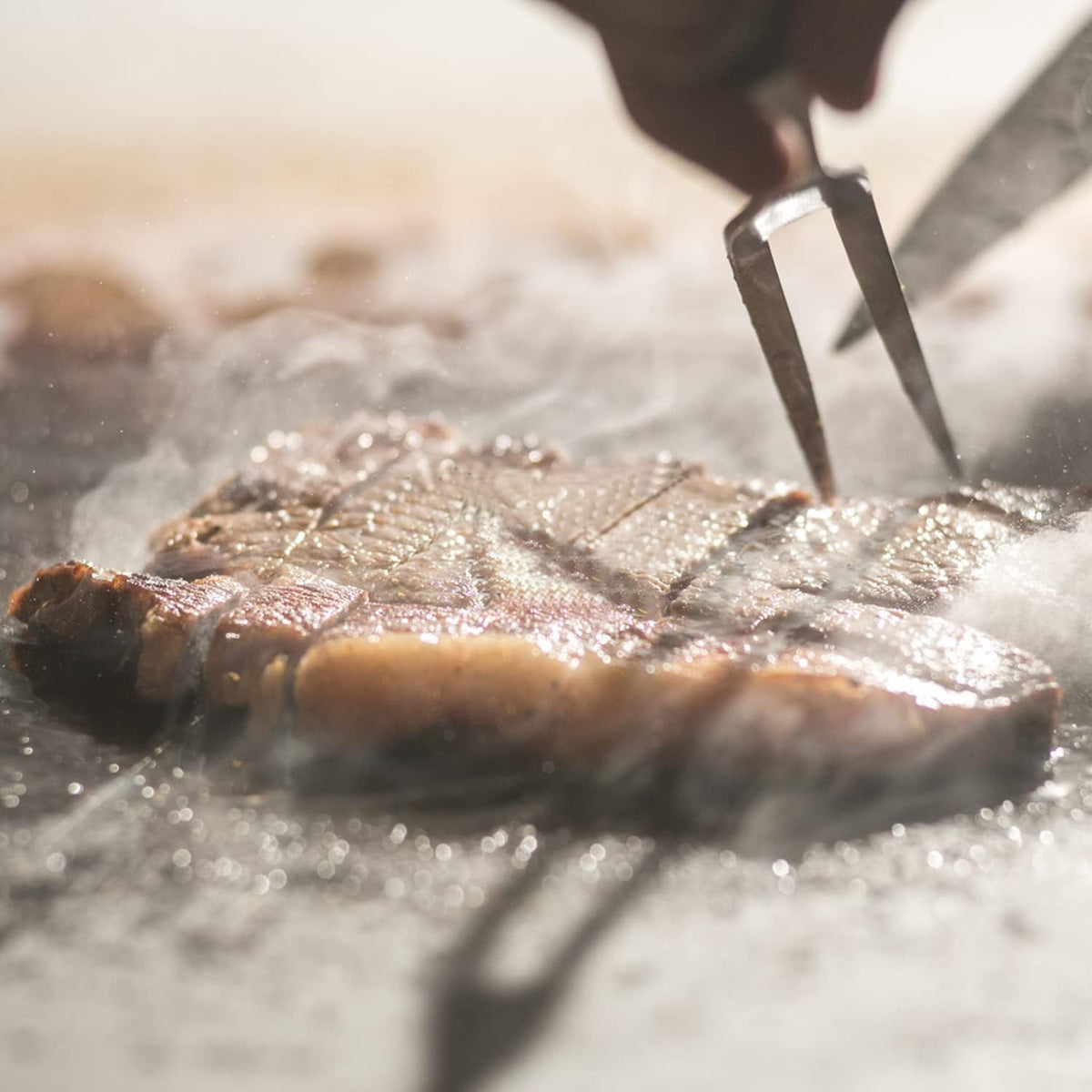 Uniflasy griddle stored with oil coat protects surface during camping trips.
