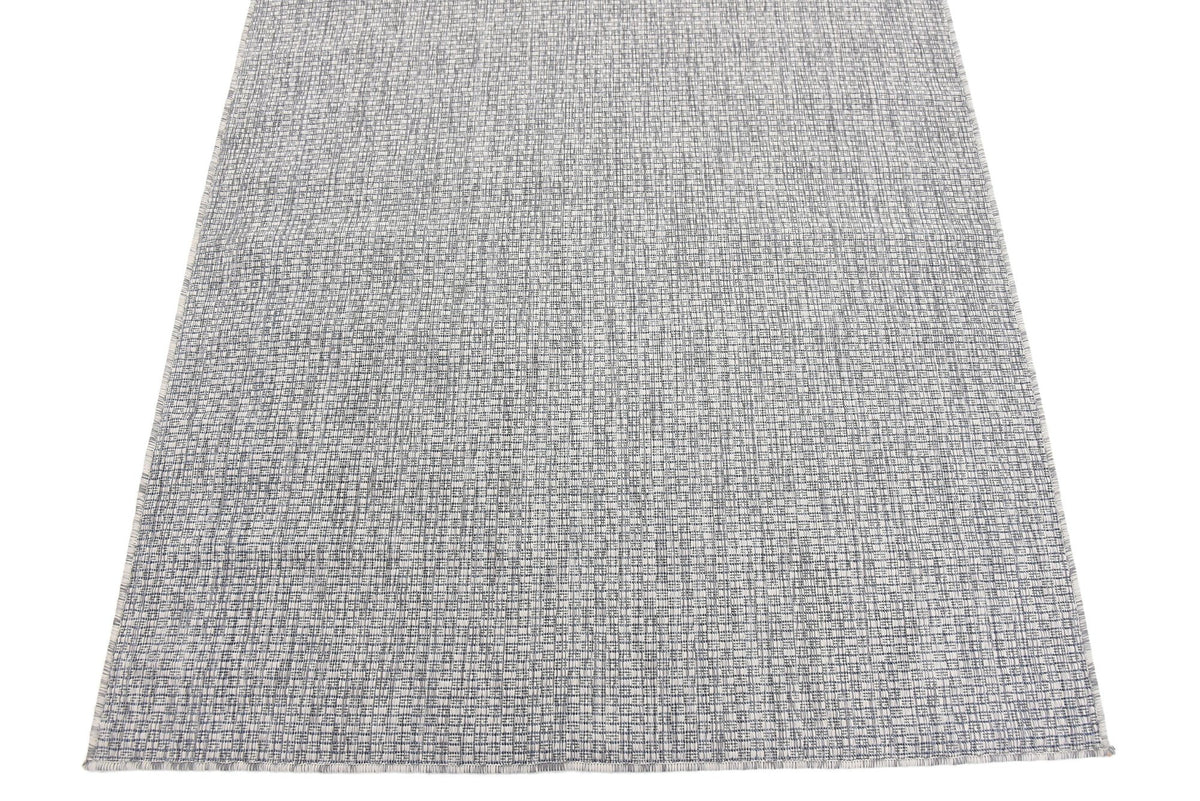 Unique Loom easy-maintenance rug supports quick spot cleaning and fresh looks.