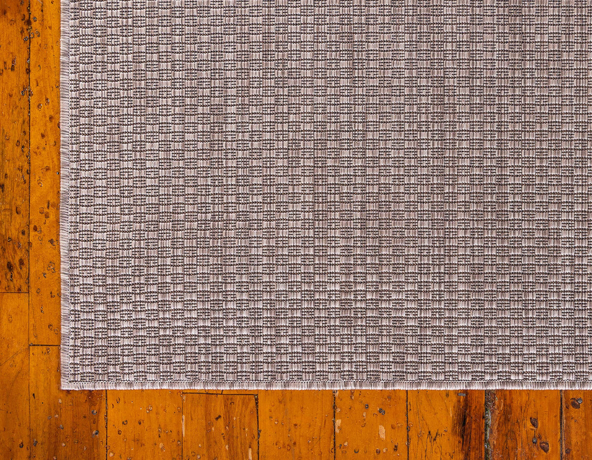 Unique Loom rug beige ivory packaging, ships rolled and ready to unfold.