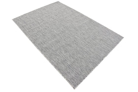 Unique Loom indoor-outdoor rug emphasizes durability in high-traffic areas.