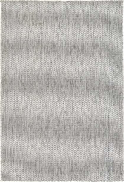 Unique Loom outdoor rug in light gray and ivory adds durable, outdoor-ready style.