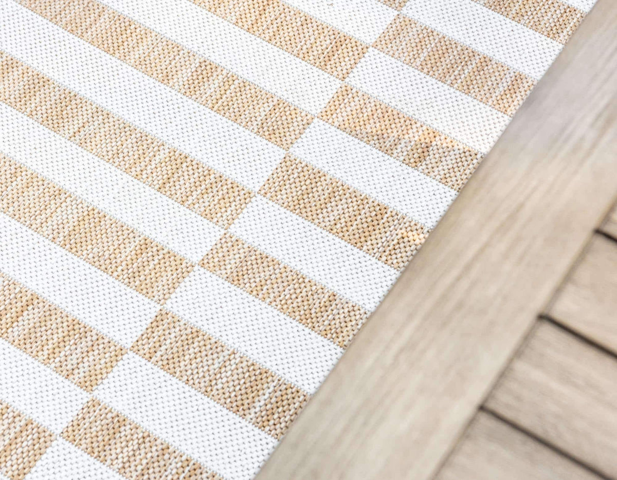 Unique Loom outdoor striped rug living room usage—low pile reduces dirt pickup