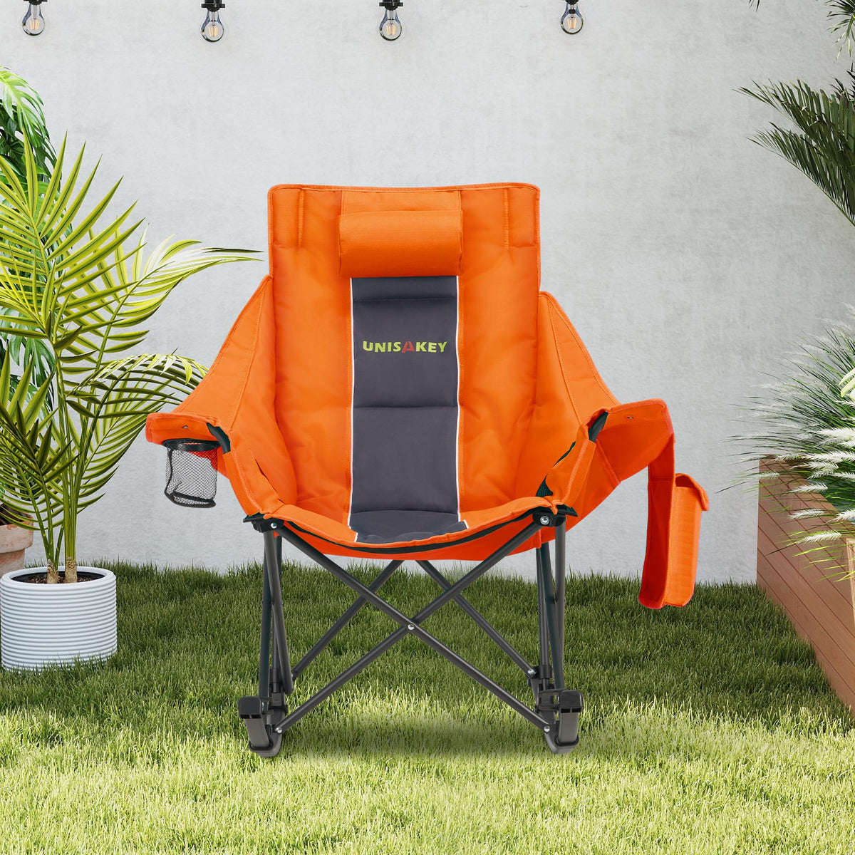 Unisakey oversized rocking chair non-slip legs provide stable seating on grass.