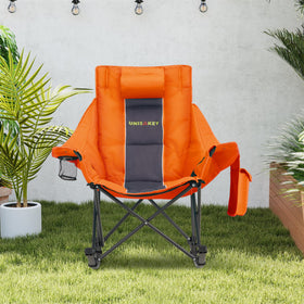 Unisakey oversized rocking chair non-slip legs provide stable seating on grass.