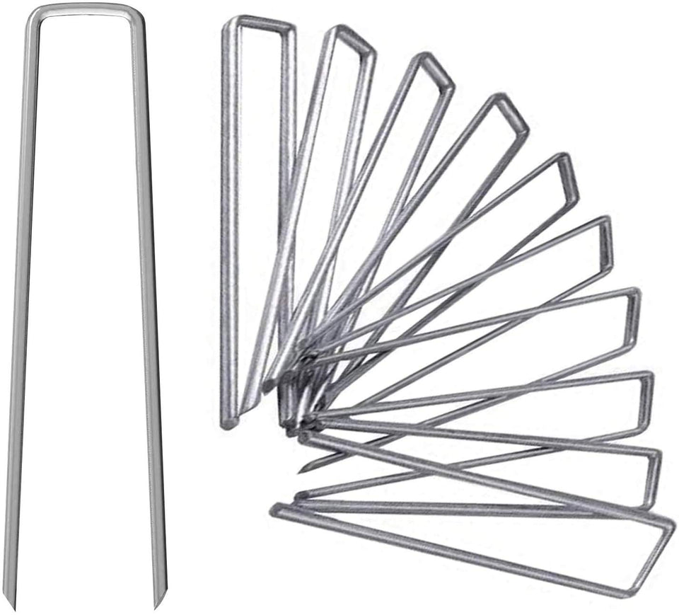 UPMCT 6-inch galvanized staple side-in-ground securing landscape fabric.