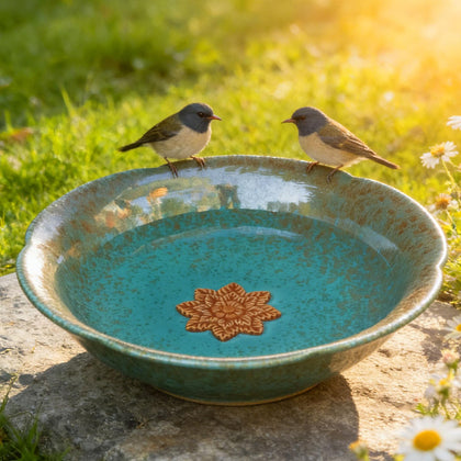 UPSJYJ bird bath 10-inch flower design provides a decorative water source for visiting birds.