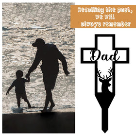 Urbraneco memorial cross stays visible without overpowering the cemetery landscape.