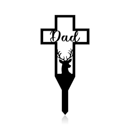 Urbraneco memorial cross with deer silhouette marks a dignified gravesite outdoors.