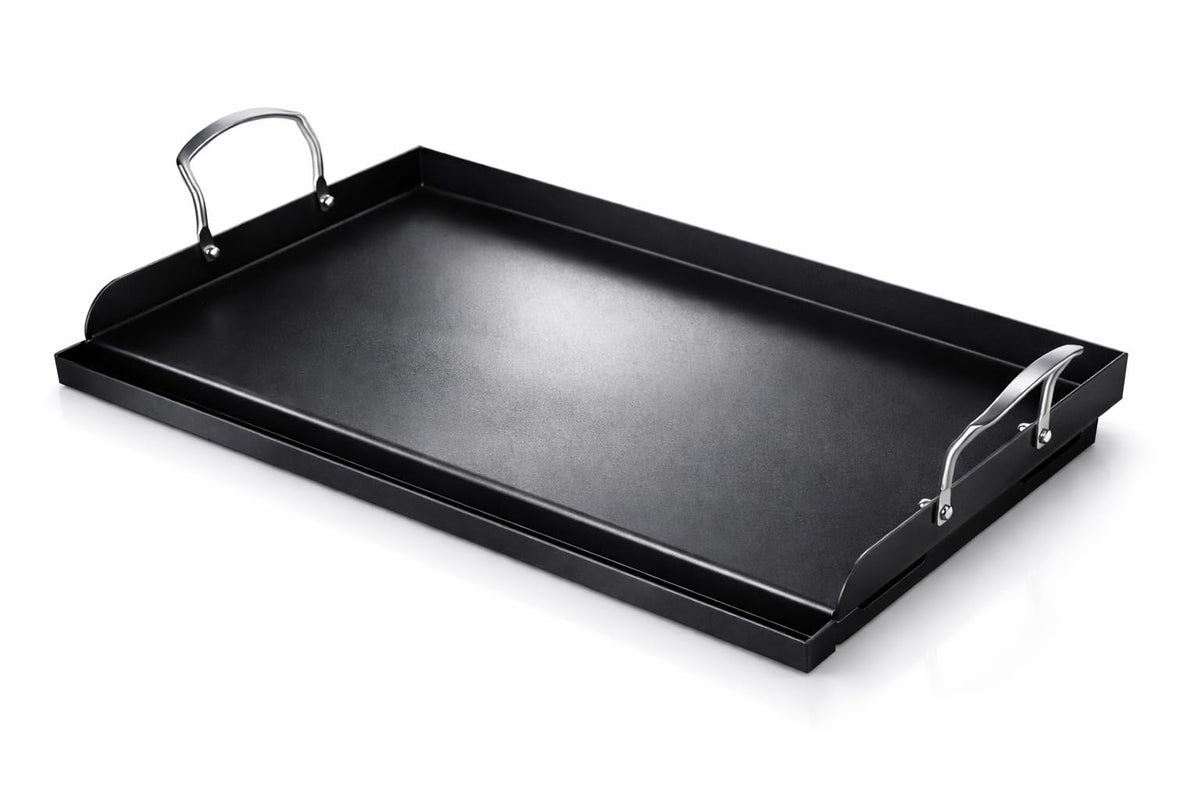 Utheer 25x16 cast iron griddle on grill, expansive surface for breakfast and BBQ cooking.