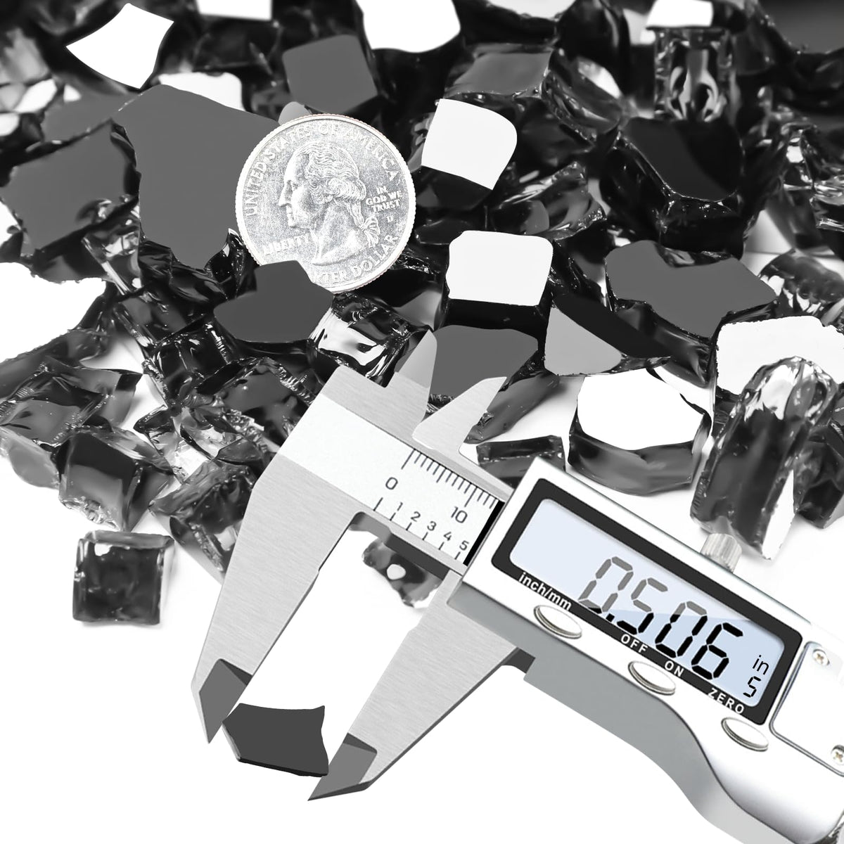 Utheer fire glass in a propane fire pit setup with radiant reflections.