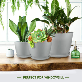 Utopia Home matching gray pot saucers protect surfaces