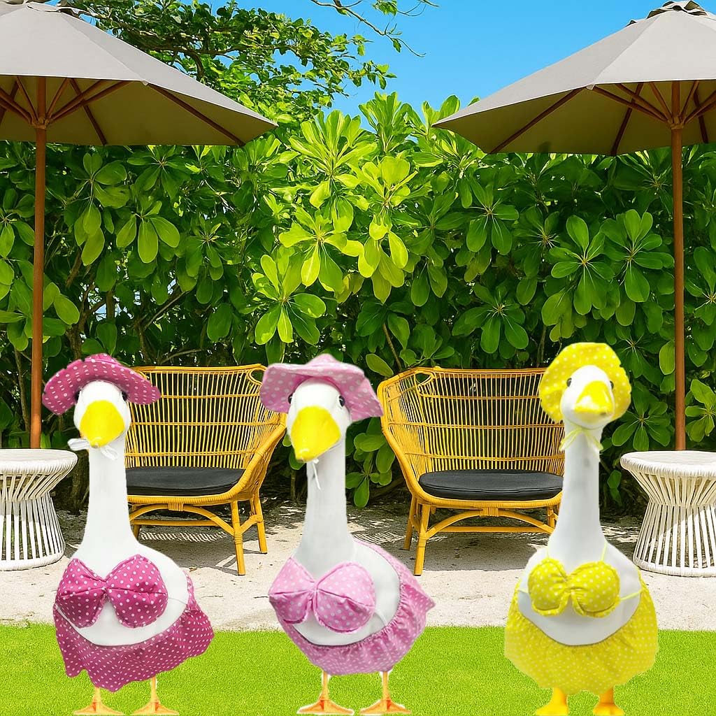 UXEWOIZ bunny ear hat and scarf bring festive flair to garden statues.