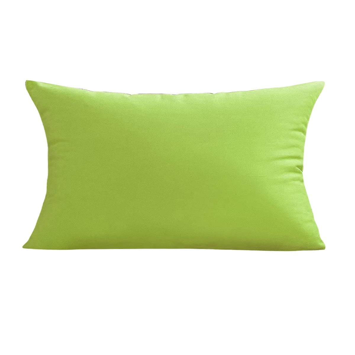 VAKADO green pillow cover on patio couch, durable protection against sun and rain.