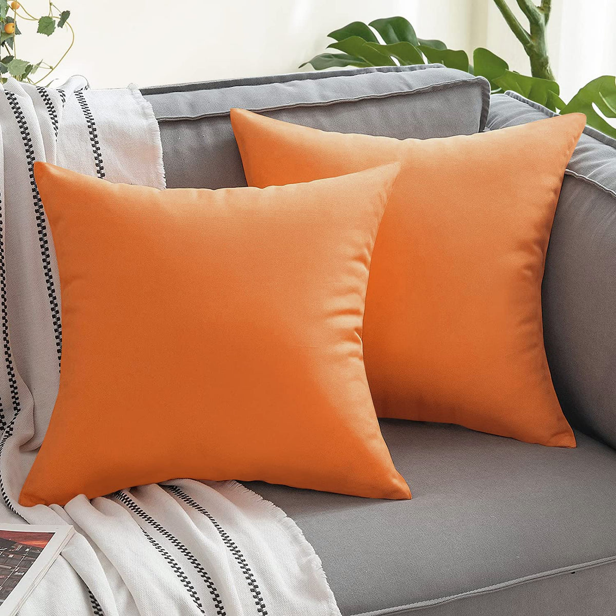 VAKADO weatherproof polyester fabric protects cushions from sun and rain.