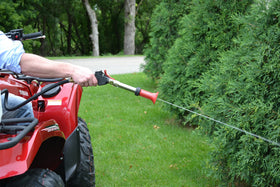 Valley Industries spray gun showing thumb lever control for easy one-handed use.