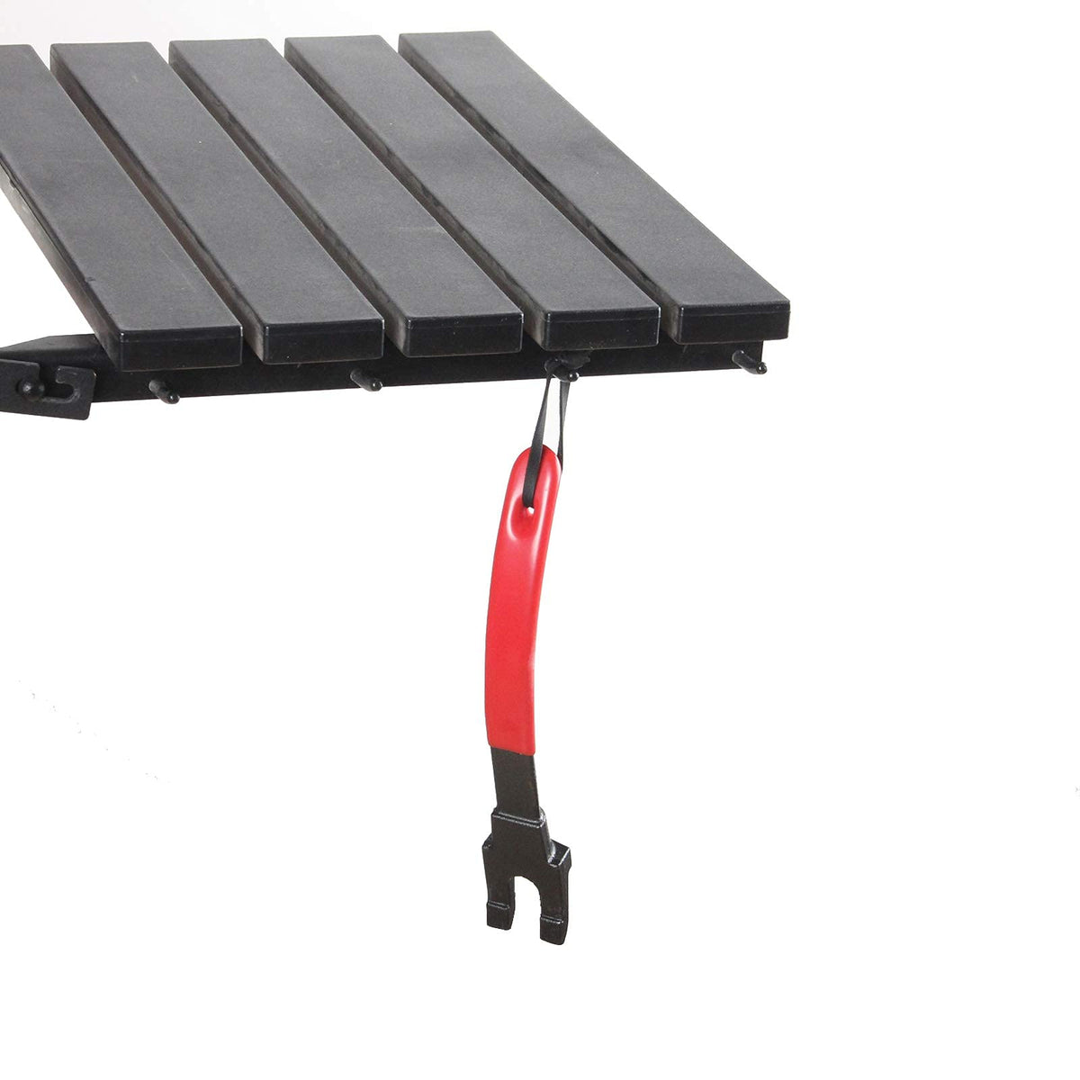 Vankey grate lifter in action moving a large cast iron grate