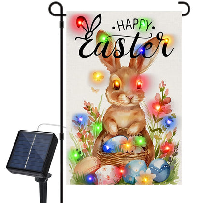 Vanleonet spring garden flag with solar LEDs lighting your yard at dusk.