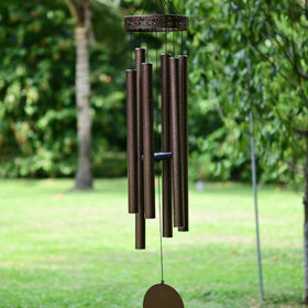 Vanquer 58-inch bronze wind chimes outdoors deliver a rich deep tone.