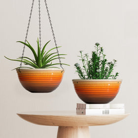 Vanslogreen 12-inch planter with drainage plugs for customizable care.