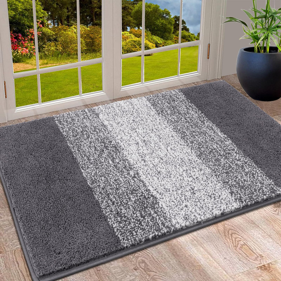 Vaukki Indoor Doormat front view with gradient design capturing mud and moisture