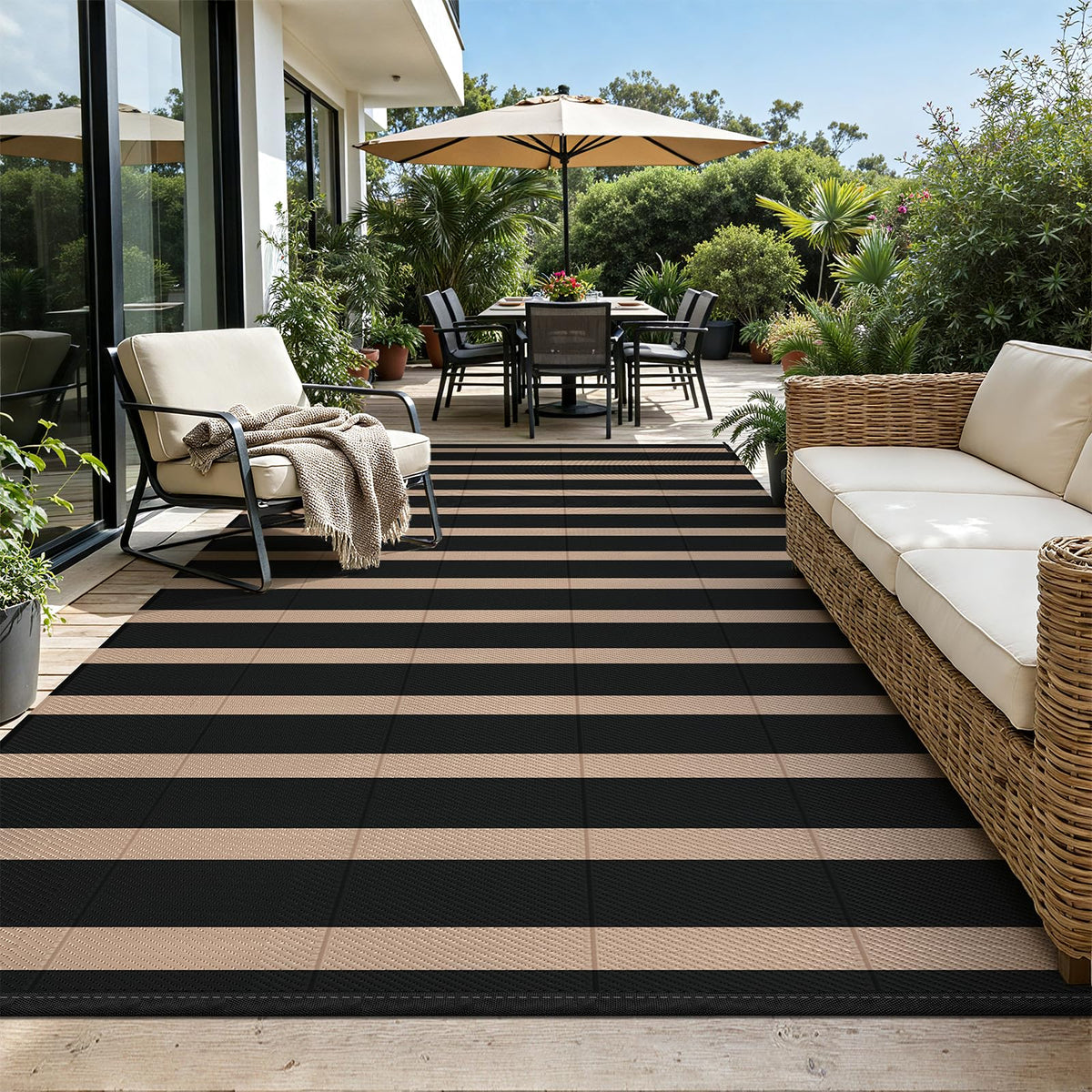 Vaukki striped outdoor rug 8x10 on patio, lightweight and comfortable for barefoot use.