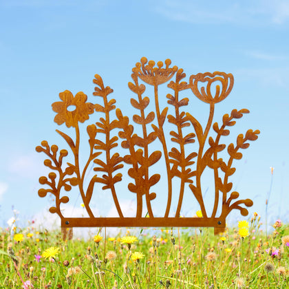 Vausart metal wildflowers stakes with rusty finish brighten garden borders.