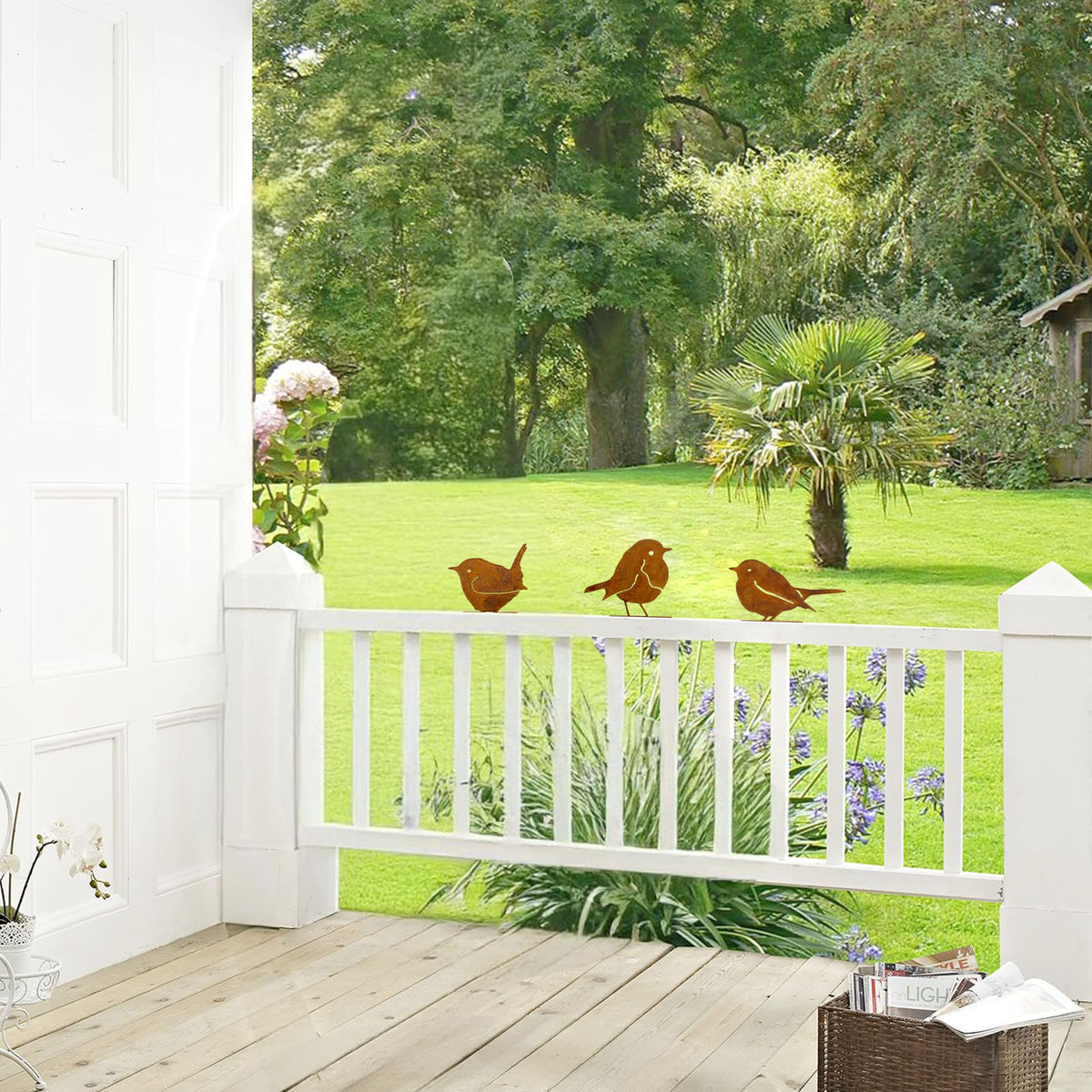 Vausart rust metal birds decor on wall adds silhouette appeal.
