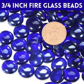 Vchin cobalt blue fire glass round 10lb enhances outdoor ambiance around the fire pit.