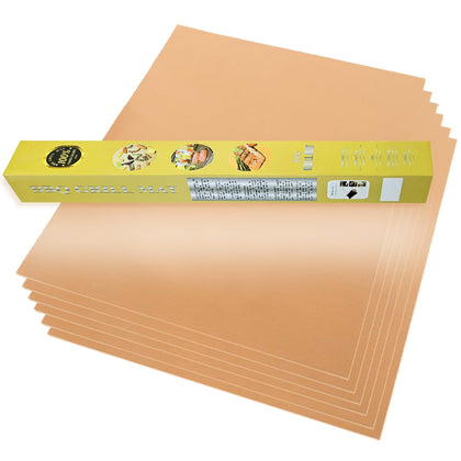 VCHOMY copper grill mats on a grill protect the grate while cooking.