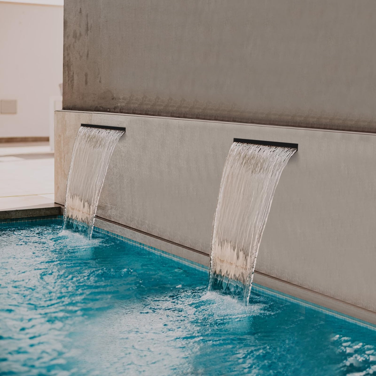 VCRAZE LED lighting for waterfall highlights nighttime ambiance in outdoor spaces