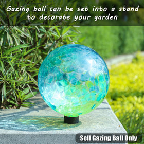 VCUTEKA blue swirl gazing ball in a garden on a stand
