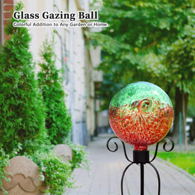 VCUTEKA glass sphere sits on the lawn, creates a reflective focal point.