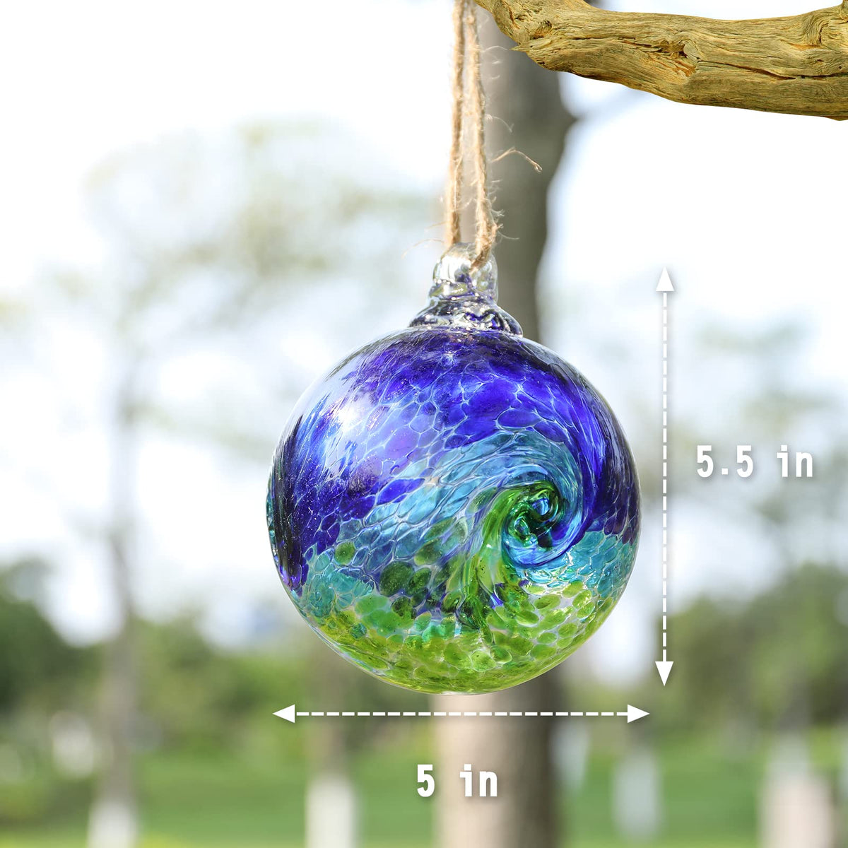 VCUTEKA glass witch ball sparkles in sun, creating lively reflections on fences and lawns.