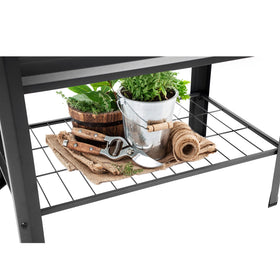 Legs and shelf of Veezyo raised garden bed ready for organizing garden tools
