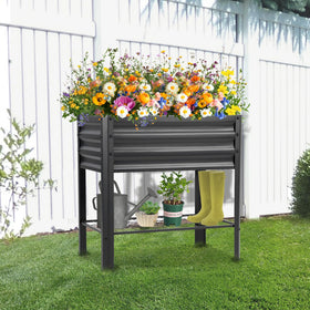 Outdoor-ready Veezyo raised garden bed in a yard setting