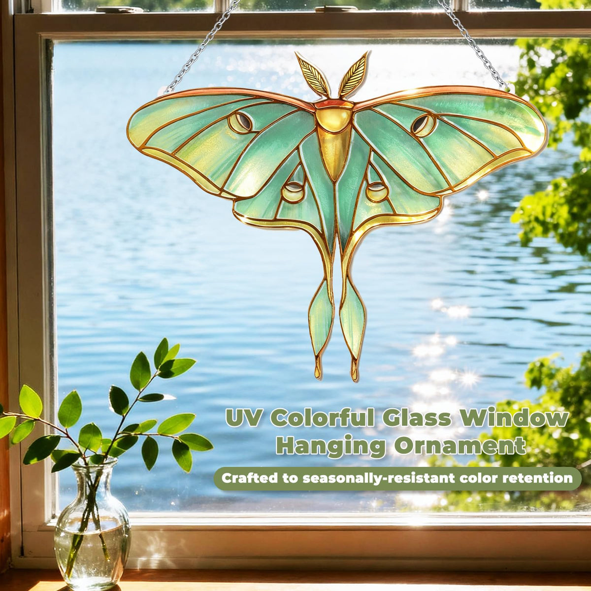 Velaboll green Luna Moth hanging in a sunlit window
