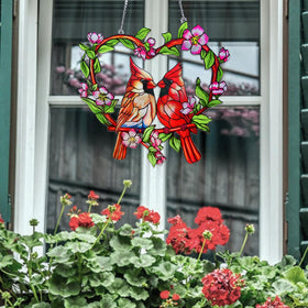 Velaboll precision-cut glass cardinal decor with bold hues.