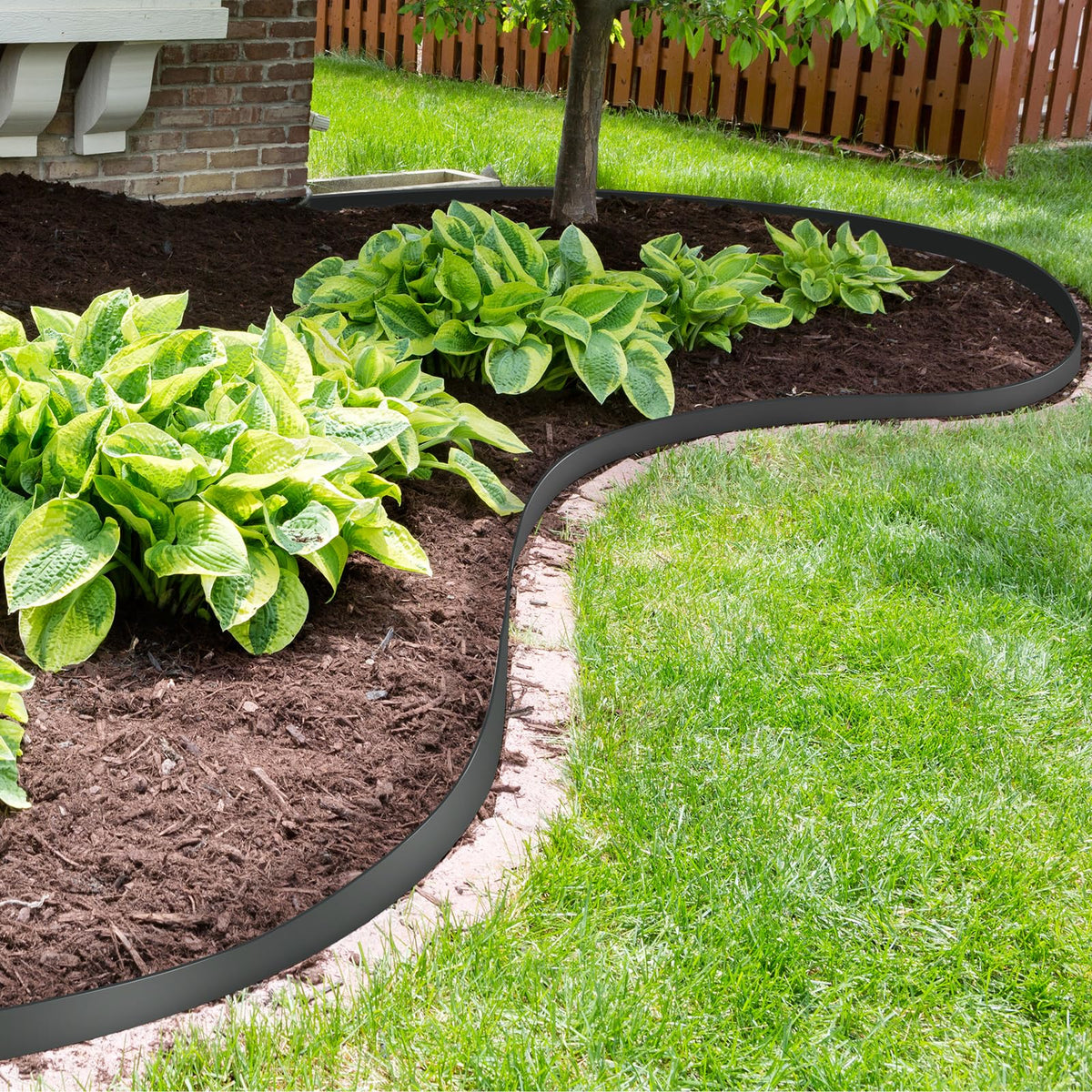 Velway edging for driveways, walkways, and flower beds creates defined borders.