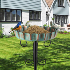 Venniy bird bath in green featuring hummingbird sculpture along the rim.