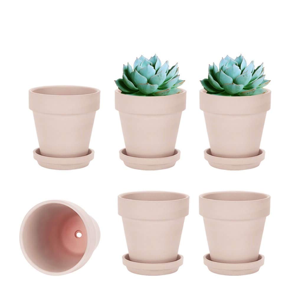 Vensovo 4-inch pink terracotta pot with saucer for indoor plant displays.