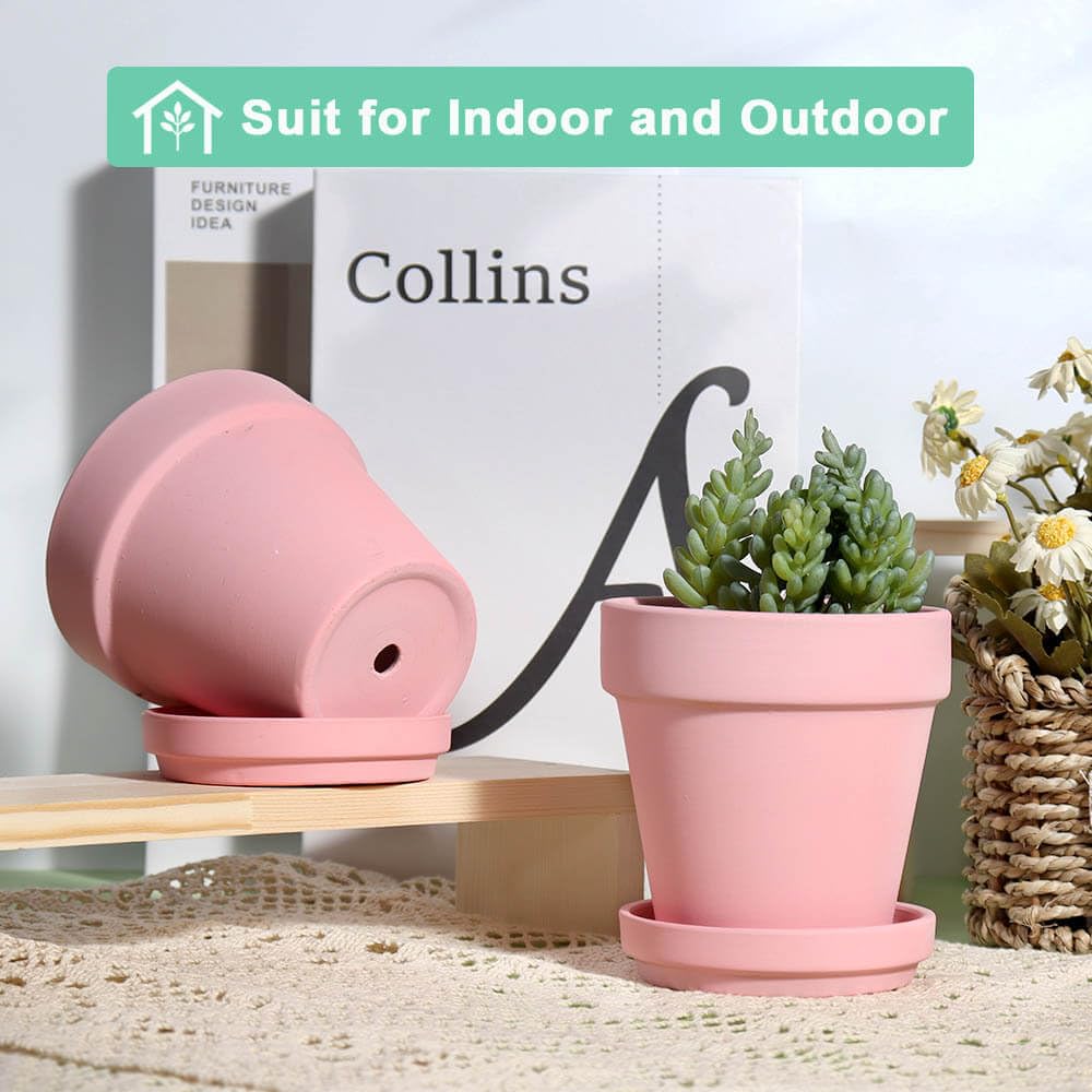 vensovo pink painted terracotta pot highlights decor while protecting surfaces with a saucer