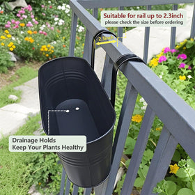 Venyat fence hanging planter decorates balcony with vibrant flowers.