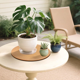 Venyat planter resting on cork coaster stays steady when moved.