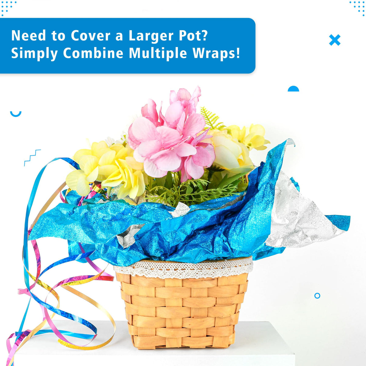 Verdanzia blue floral wrap ready to cover a nursery pot.