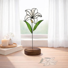 Verssure stained glass flowers with walnut base catching sunlight for bright home decor.